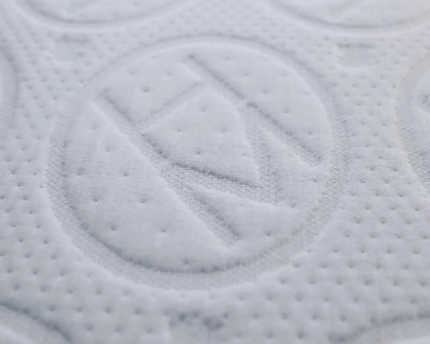 Close-up of Haven logo on mattress.